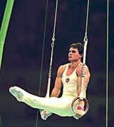 Гимнастика (упражнение на кольцах)