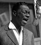 Коул Нат (у микрофона)