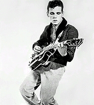 Эдди Дуэн (с гитарой)