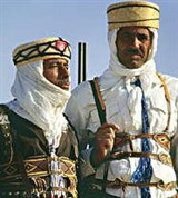 Тунисцы (в традиционной одежде)