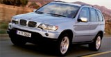 BMW X5 вид спереди в движении 1