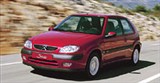 Citroën Saxo 1.6i 16v VTS в движении на фоне горного пейзажа