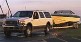 Ford USA Excursion с катером на трейлере