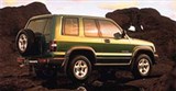 Isuzu Trooper вид сзади сбоку