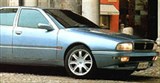 Maserati Quattroporte вид сбоку