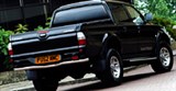 Mitsubishi L200 Warrior (вид сзади)