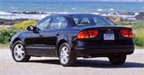Oldsmobile Alero вид сбоку сзади